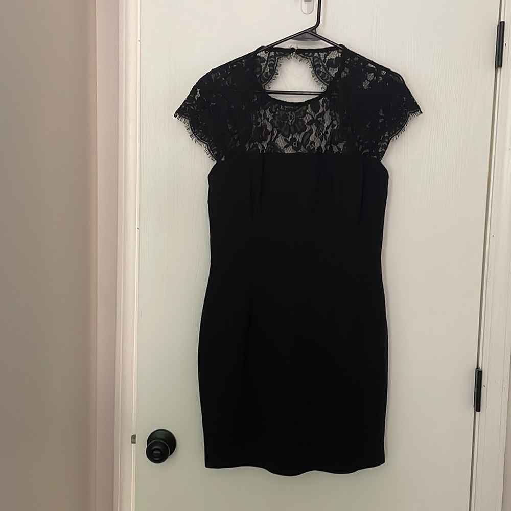 Never worn with tags black lace cap sleeve lulu’s dress w/ key hole back-size XL